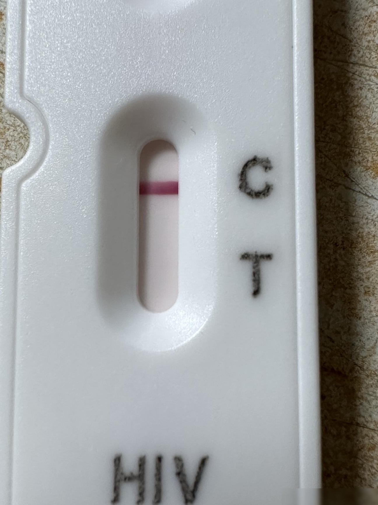 万孚HIV试纸淡灰影原因