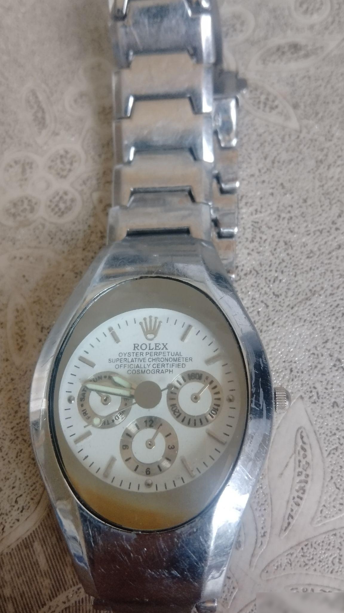 家里翻出ROLEX表，是真货吗？