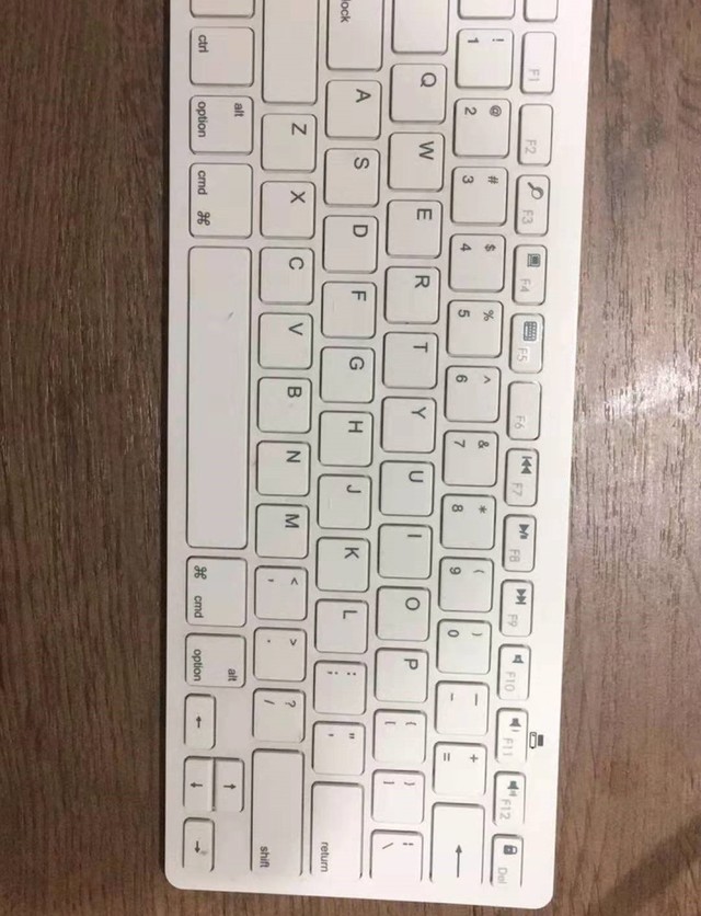 关于键盘 我家里有个几年前从miniso买的白色蓝牙键盘 那天收拾出来