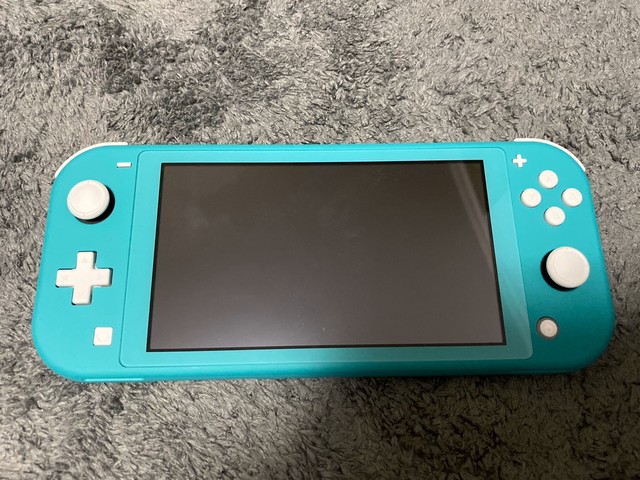 lite蓝绿色,盒子比switch的盒子小很多,本以为和iphone11是一个颜色